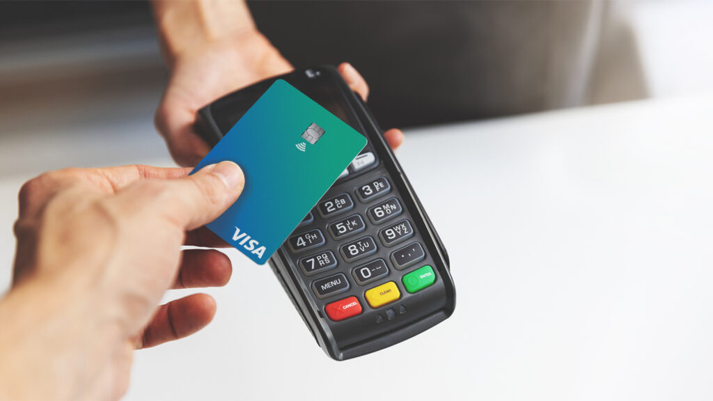 nfc contactless payment by credit card and pos terminal. copy space